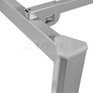 Estructura rubí de trabajo compartido con división acrílica y base metálica en oficina moderna.