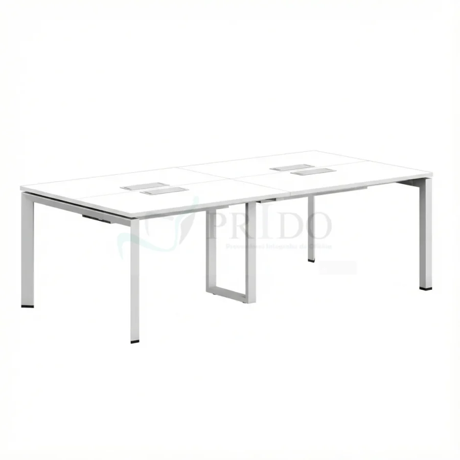 Estación de trabajo moderna color blanco con base metálica y superficie para cuatro usuarios en oficina.